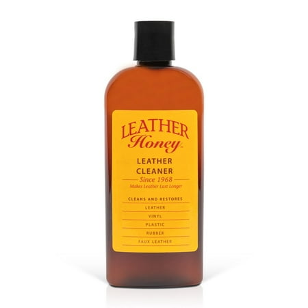 En brun plastflaske Leather Honey Non-Toxic Leather Cleaner, 8 Oz, med svart kork og gul og rød etikett