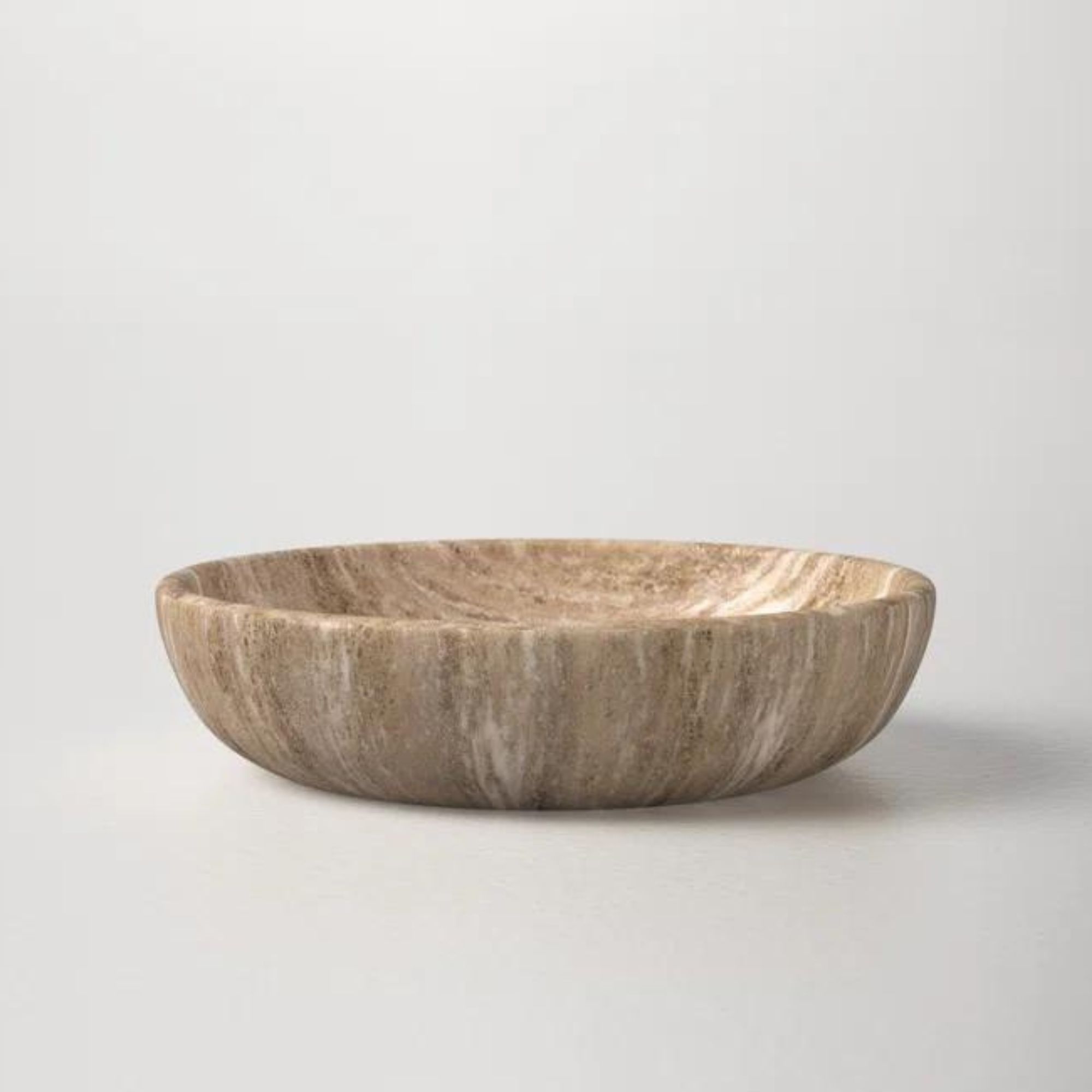 En dekorativ skål i naturstein fra Wayfair