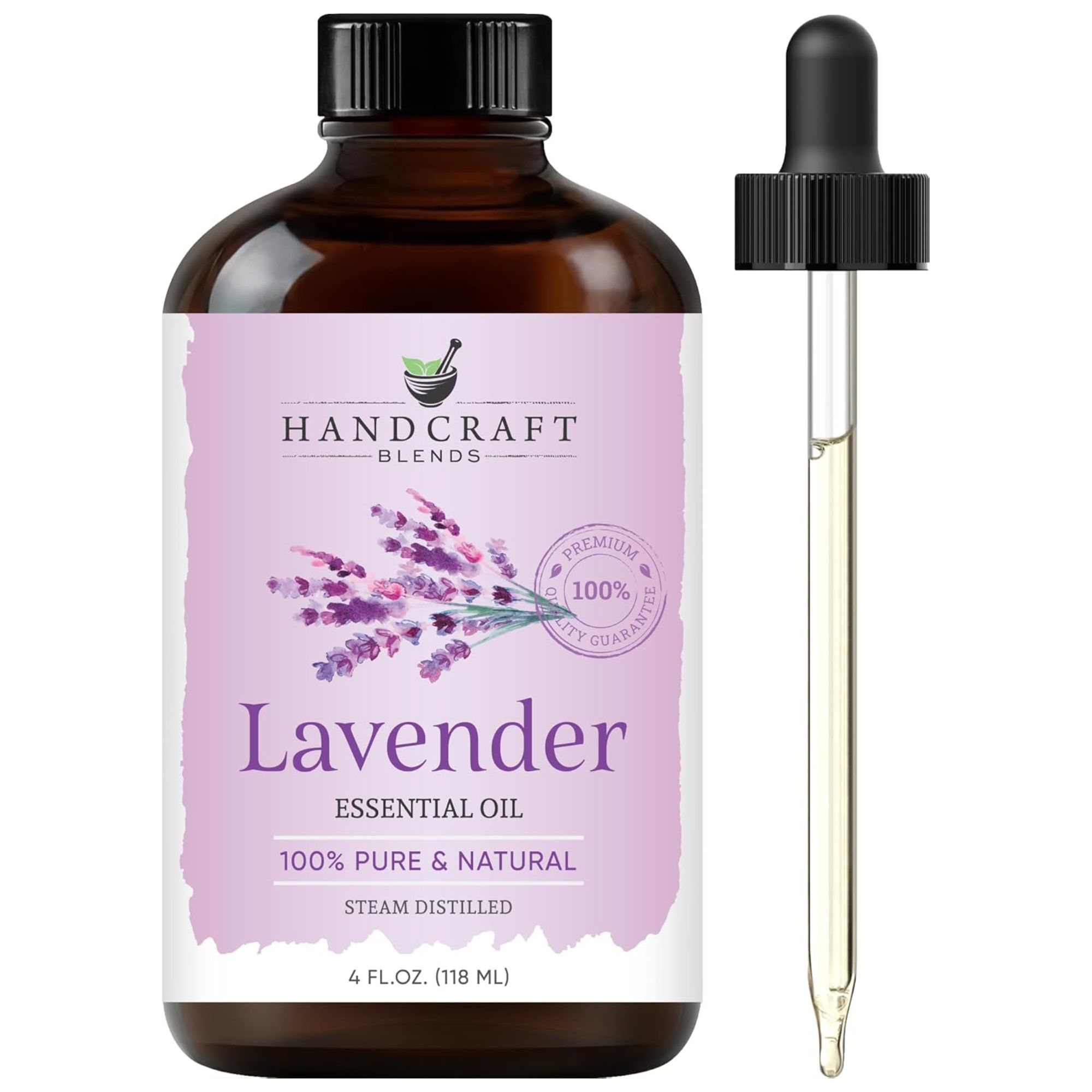En brun flaske lavendel eterisk olje med rosa etikett og pipette