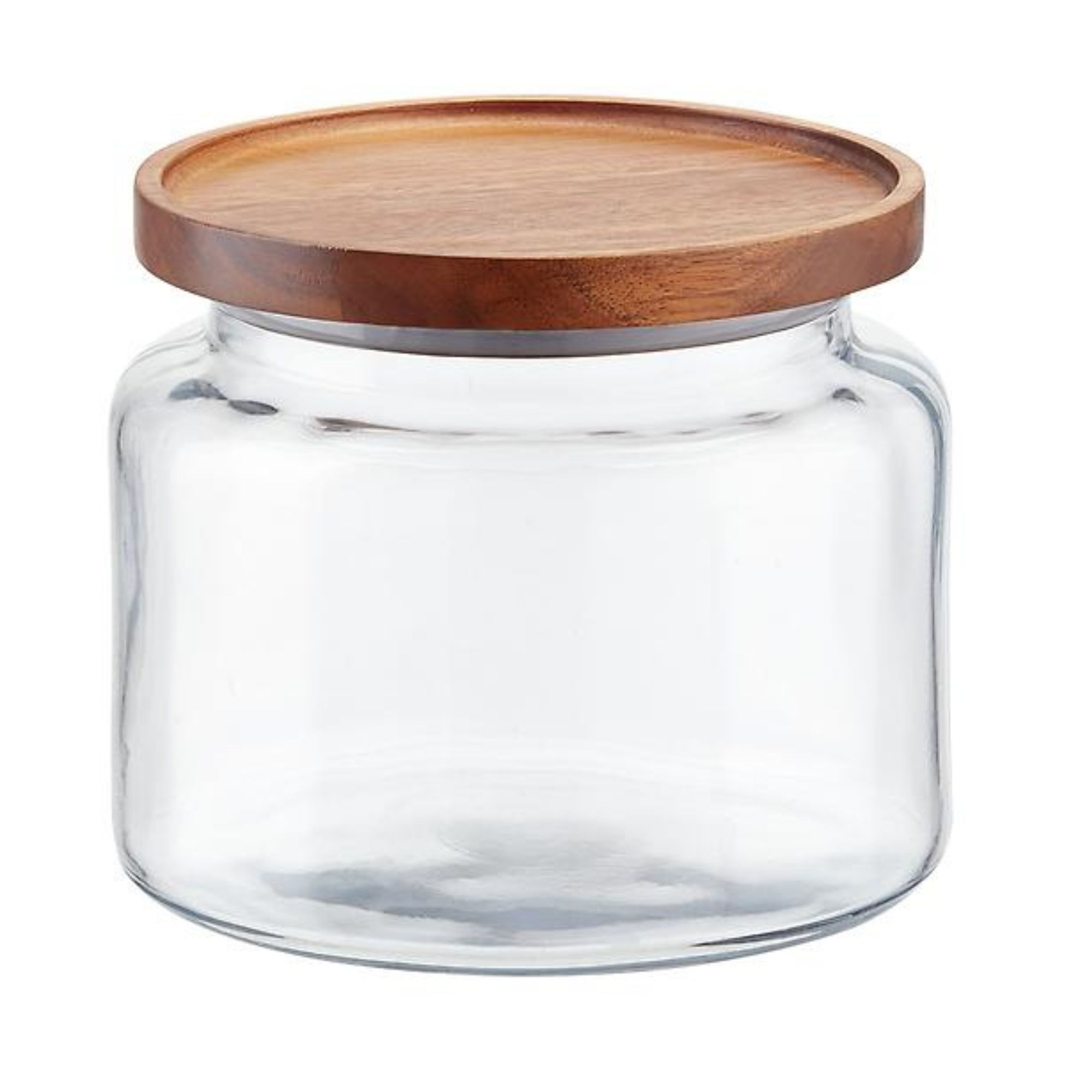 En bred rund glasskrukke med lokk i naturlig tre