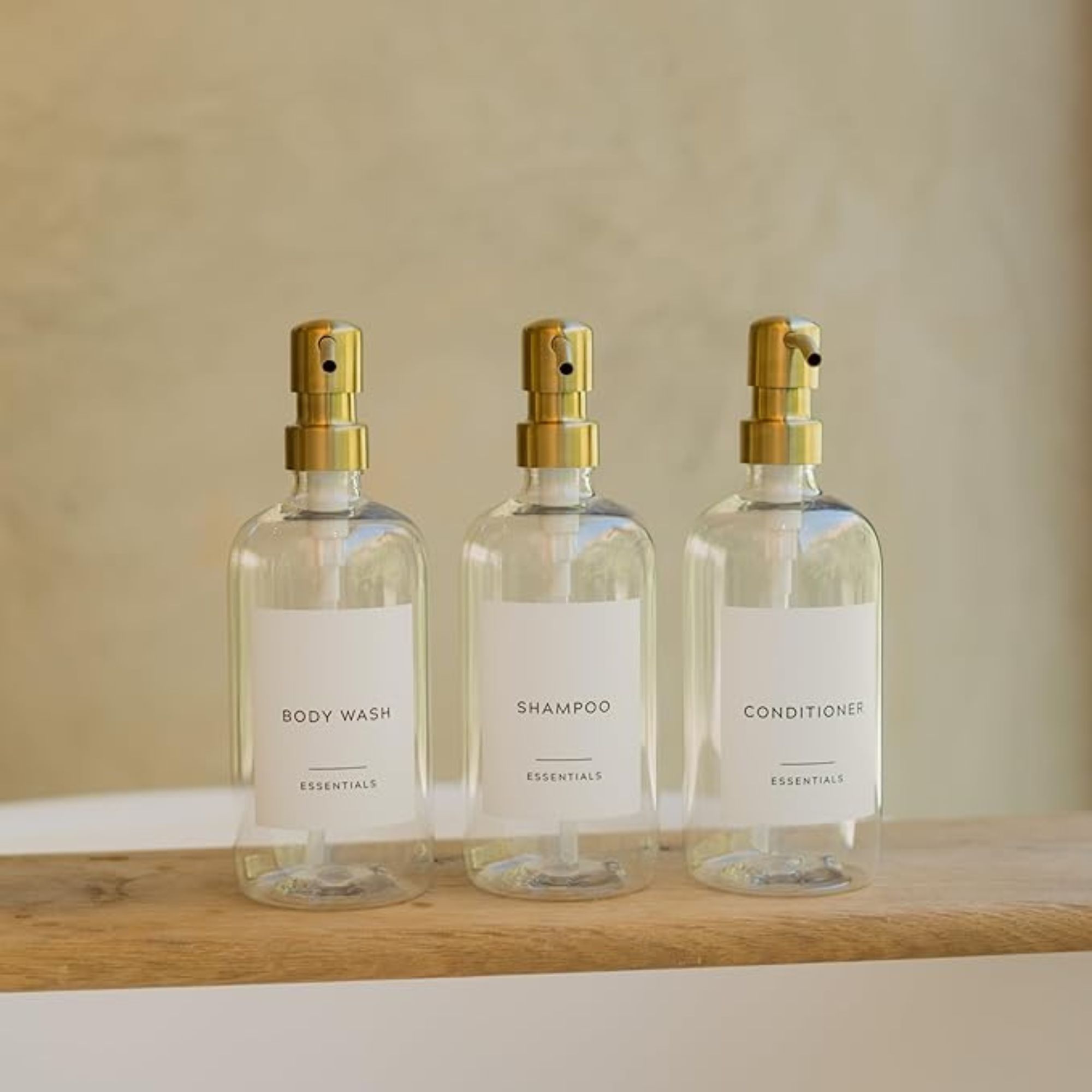Stilig dispenser for sjampo og balsam