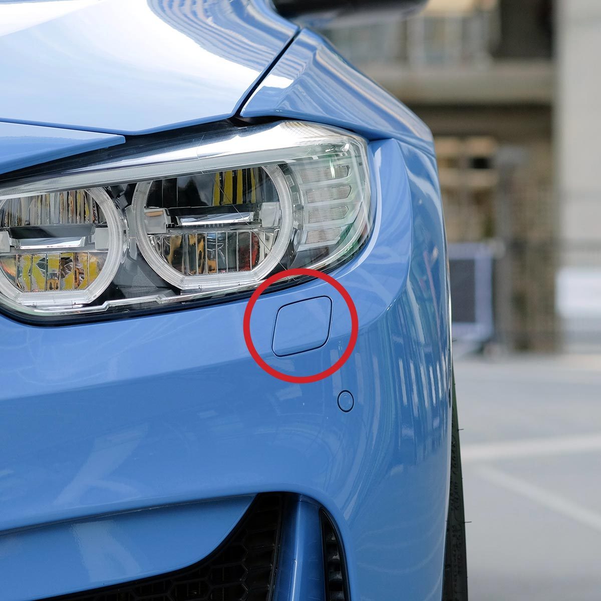 Here’s What The Small Panel On Your Car’s Front Bumper Is For