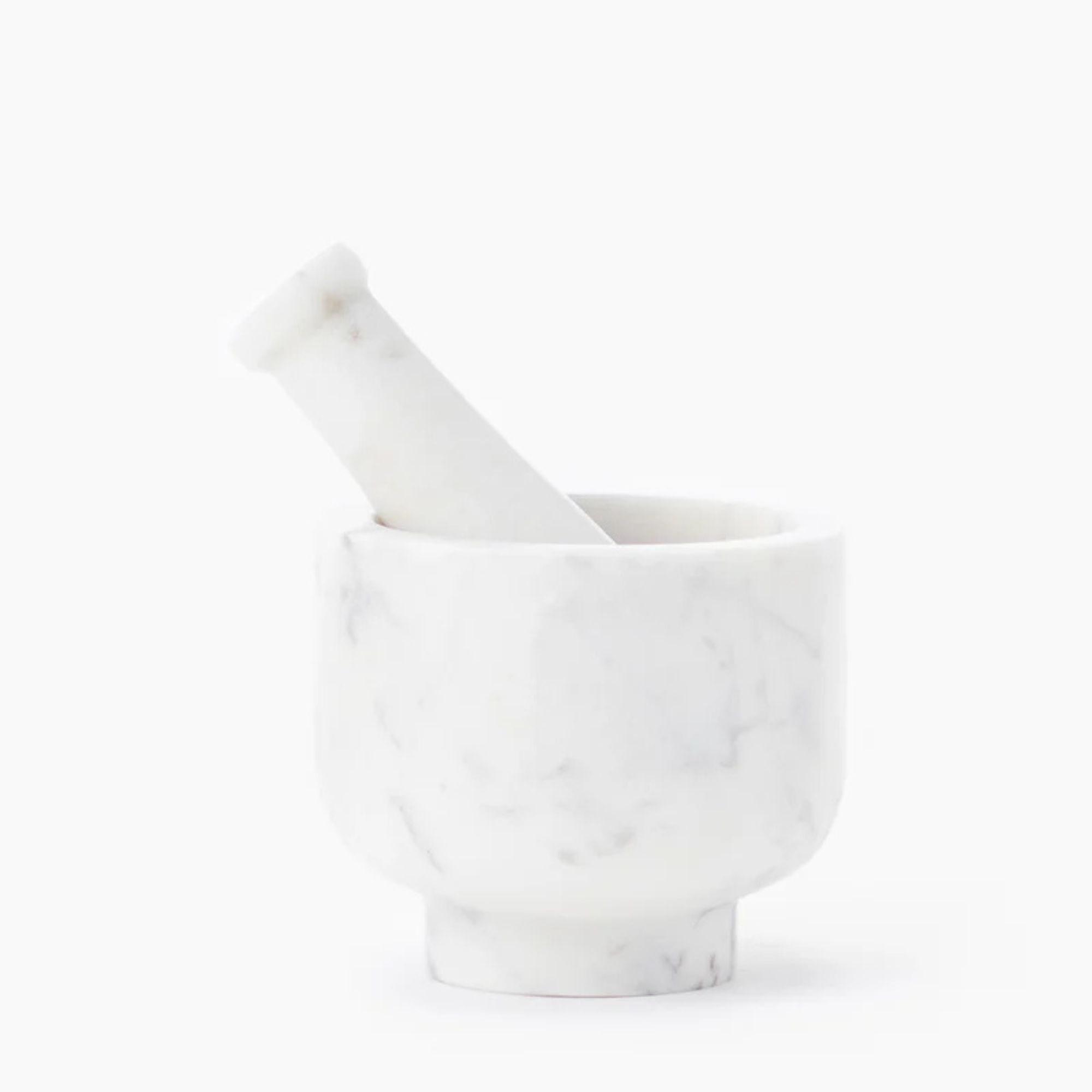 Hvit marmormørtel og pestle